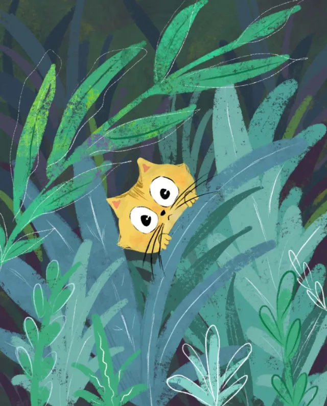 Cat peeking through green foliage by Dalia Awad