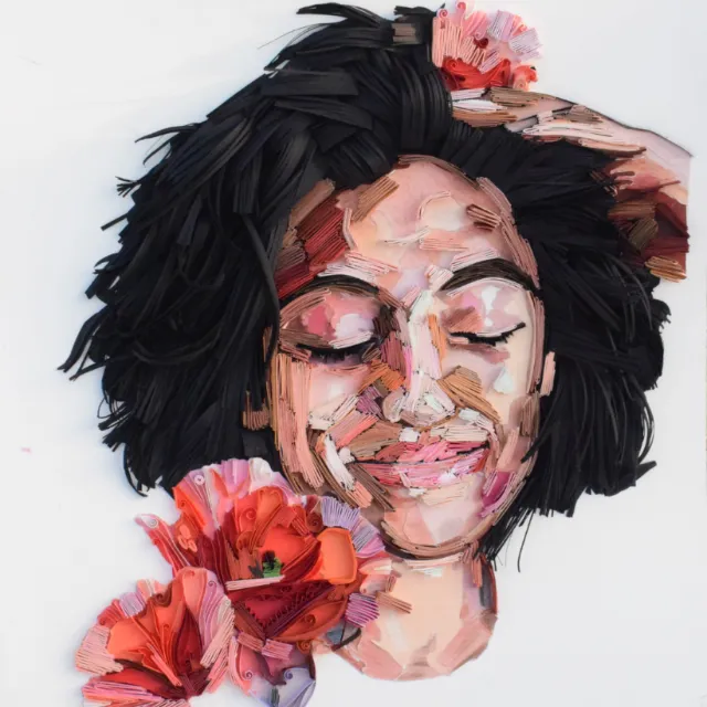 Paper-cut portrait of smiling woman with closed eyes and pink flowers by Glimpsecraft