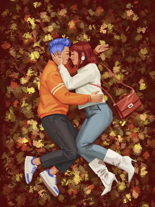 Couple embracing on autumn leaves, fall colors, by Ede Studio