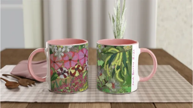 Two ceramic mugs with floral and leaf patterns by Sarah Beetson