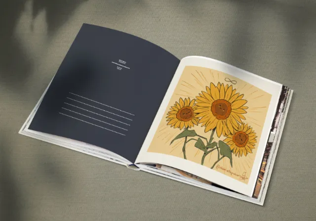 Open book with illustration of three sunflowers on a beige background by Danielle Pioli