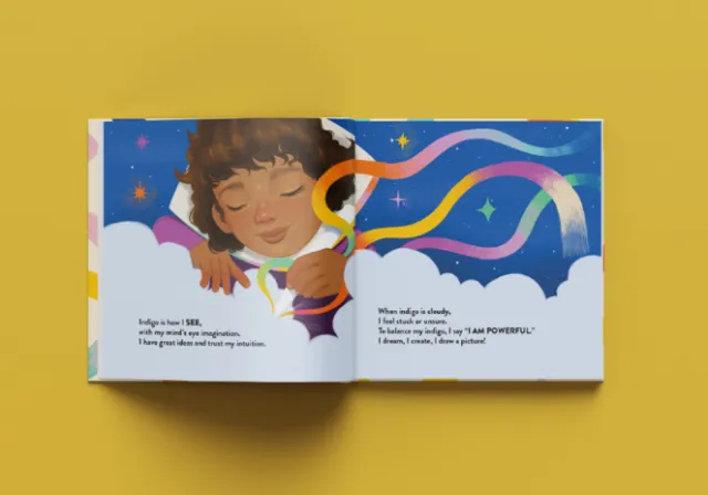 Child with rainbow ribbons emerging from an open book by German Gonzalez