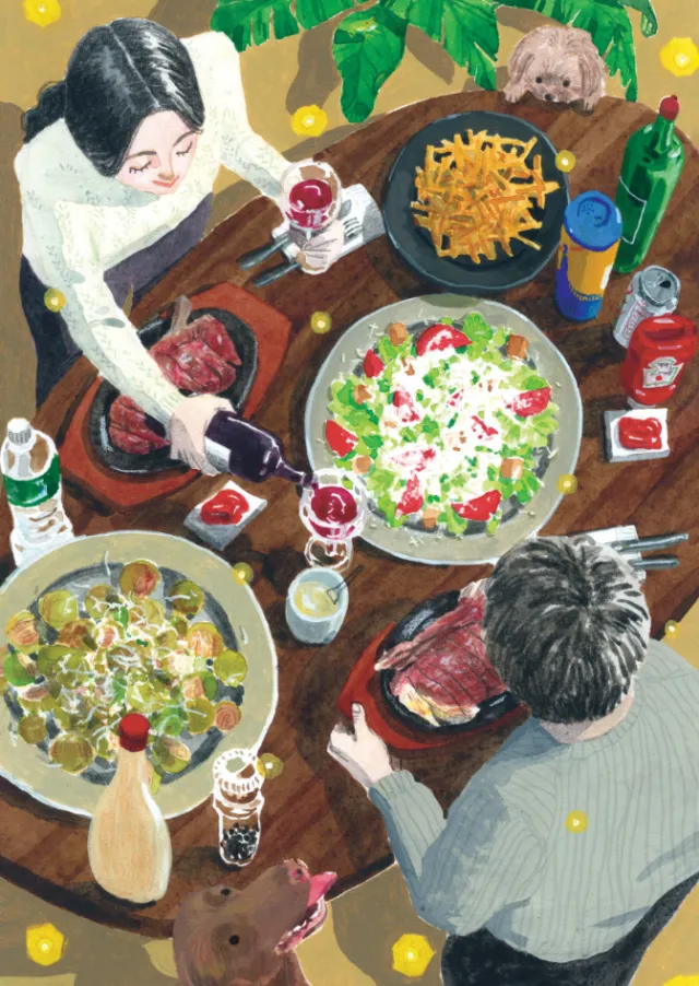 Couple sharing dinner with salad and wine by Maki Yamaguchi