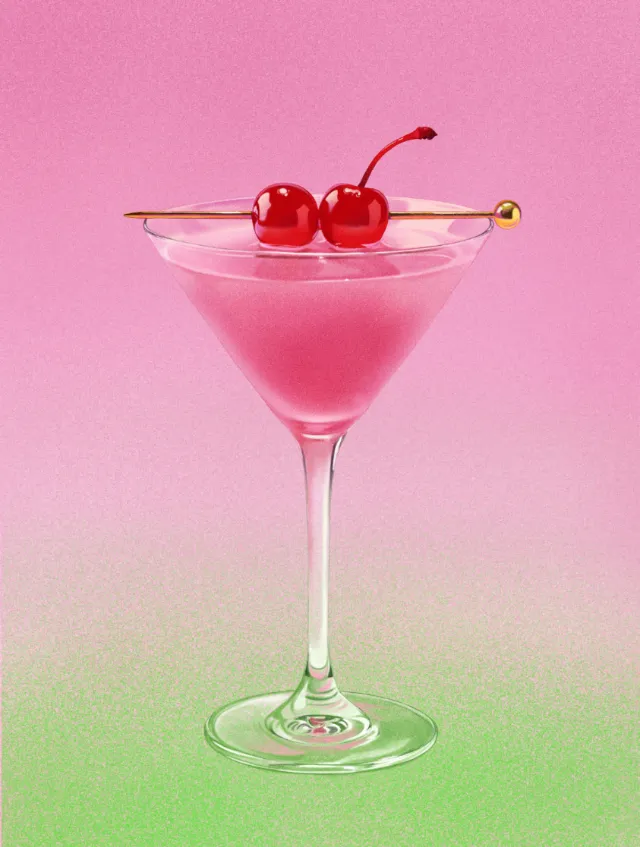 Pink cocktail with two cherries in martini glass by Julia Prokhotskaya
