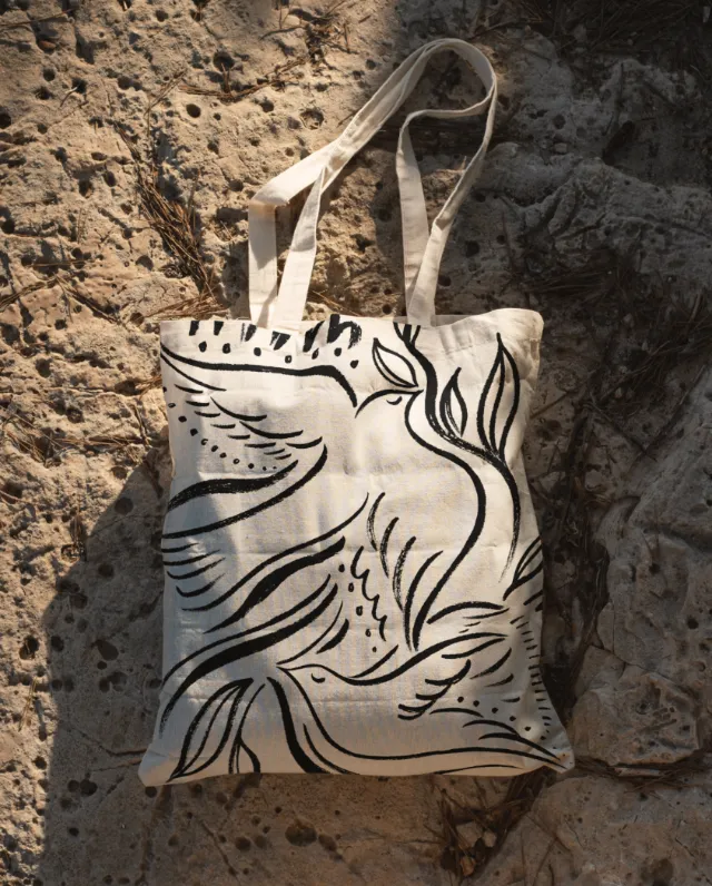 Canvas tote bag with abstract bird design by Nadia Flower