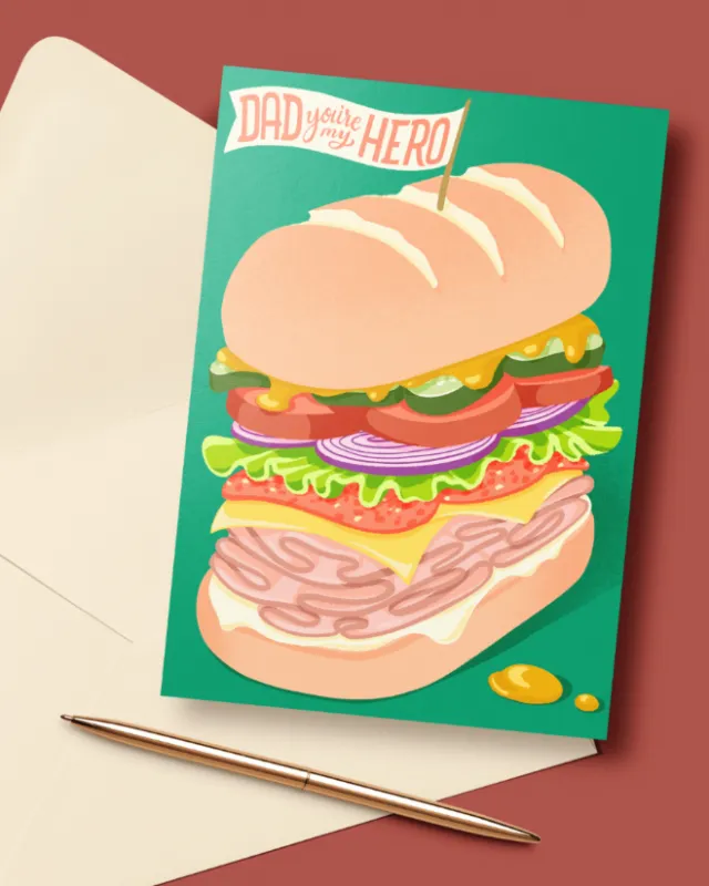Greeting card with sandwich and 'Dad you're my hero' text by Alissandra Seelaus