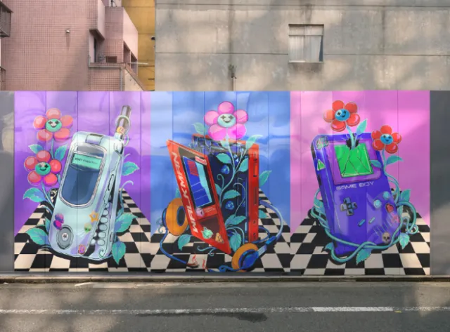 Heymoonly Dale mural featuring three colorful retro boomboxes with flowers