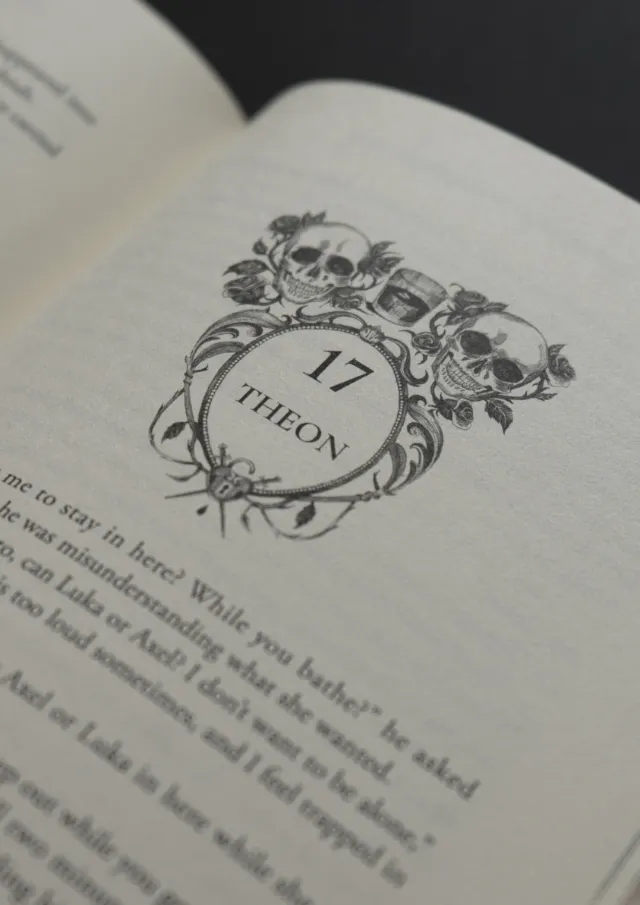 Studio Duco skull and floral frame illustration on a book page