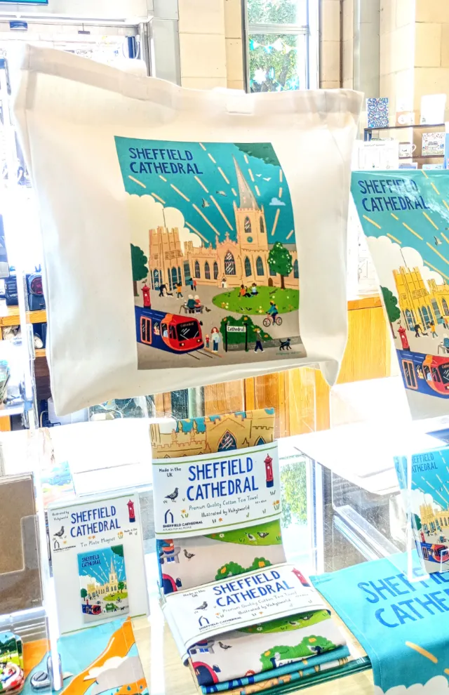 Vicky Scott Sheffield Cathedral illustration merchandise displayed in a shop