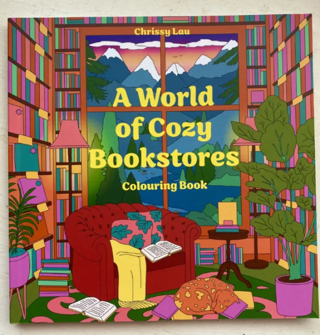 Chrissy Lau's colorful A World of Cozy Bookstores coloring book spread