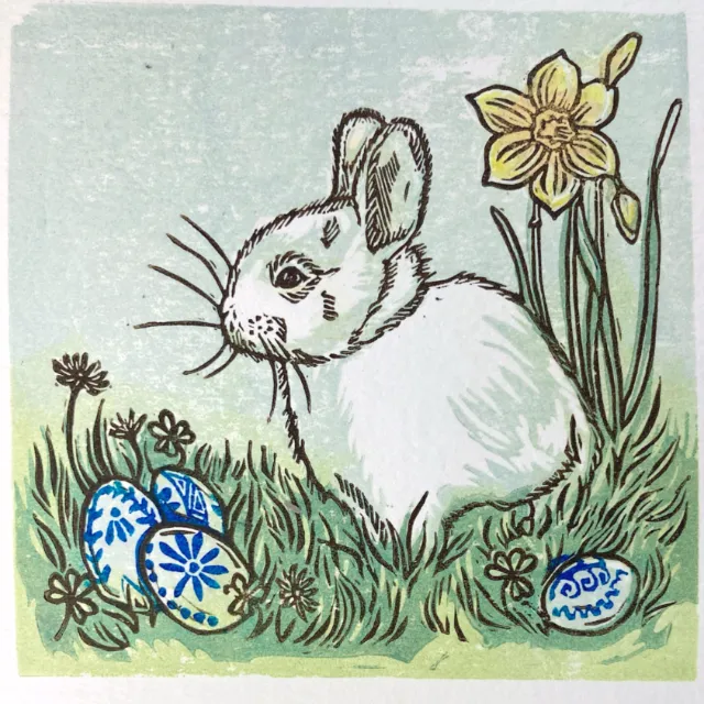 Easter bunny lino cut by Emily Robertson with decorated eggs and daffodils