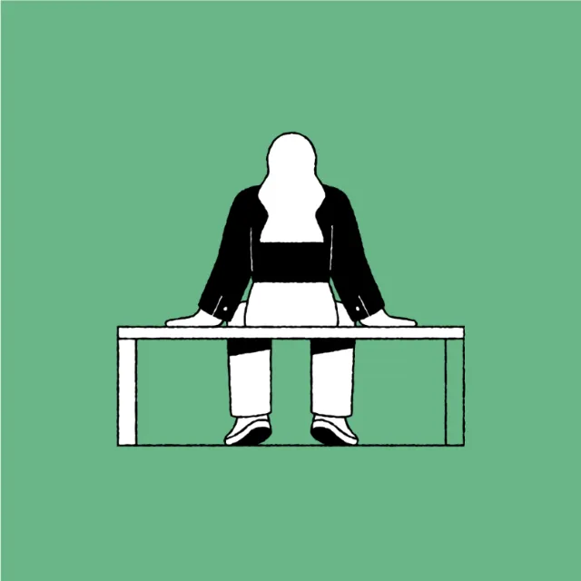 Minimalist faceless figure behind a table by Joseph Carrington