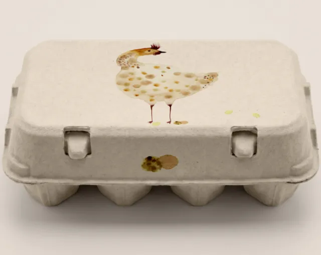 Nadia Flower artwork showing a delicate bird painted on a closed egg carton