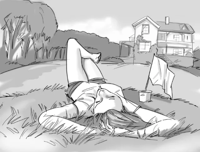 Person lying on grass near house under trees by Björn von Schlippe
