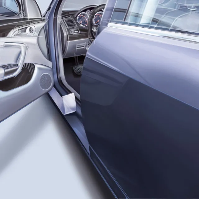 Interior view of a car with open door, showing dashboard and door panel by Eberhard Reimann