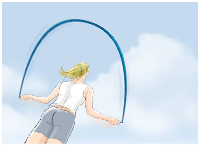 Woman skipping rope in athletic clothing outside under blue sky by Andreas Schickert