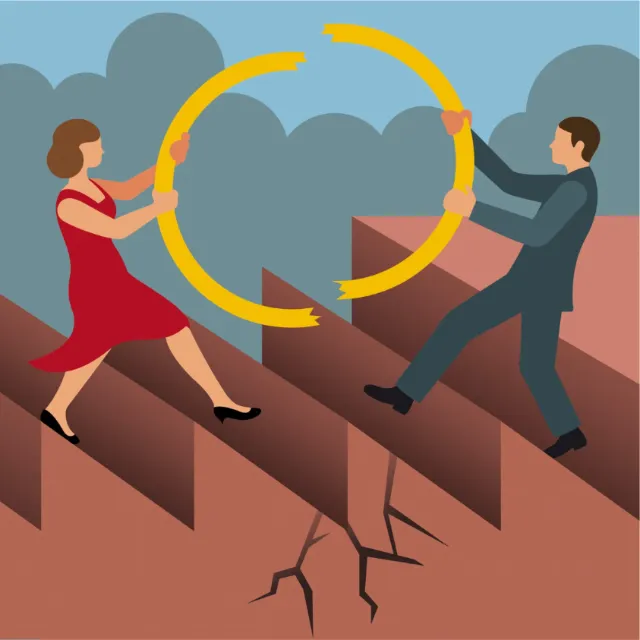 Woman and man holding yellow circular object over cracked ground by Klaus Meinhardt