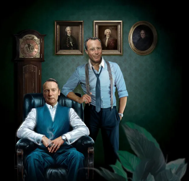 Portrait of two men in vintage clothing in a classic room by POW!!!