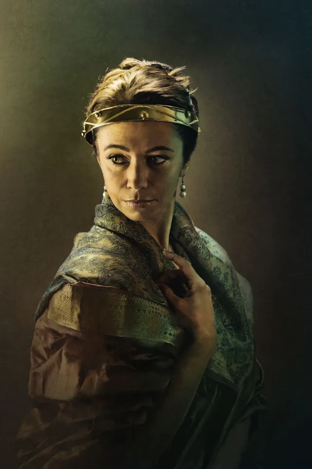 Portrait of a thoughtful woman wearing a headband and draped fabric by Tom Krieger